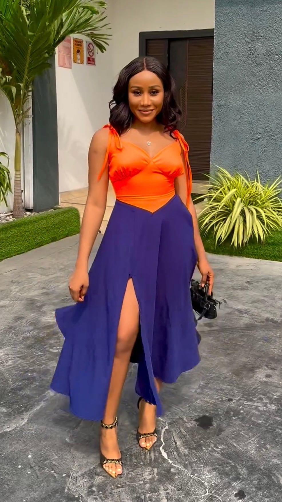 MIDI length color block dress made with crepe fabric. Sewn in lagos Nigeria